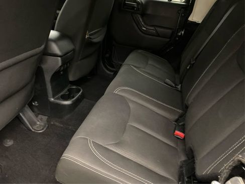 Used 2014 Jeep Wrangler Unlimited Sahara w/ Dual Top Group AWD/4WD image 11