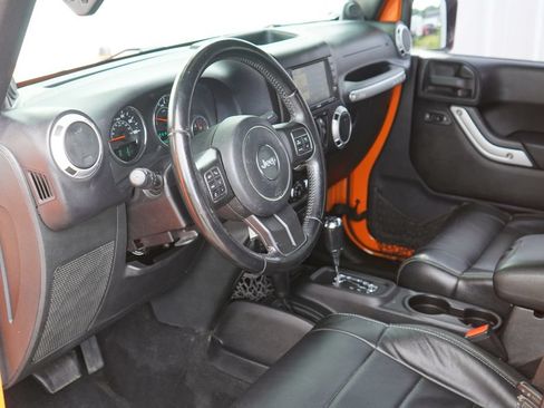 Used 2012 Jeep Wrangler Unlimited Sahara w/ Dual Top Group AWD/4WD image 12