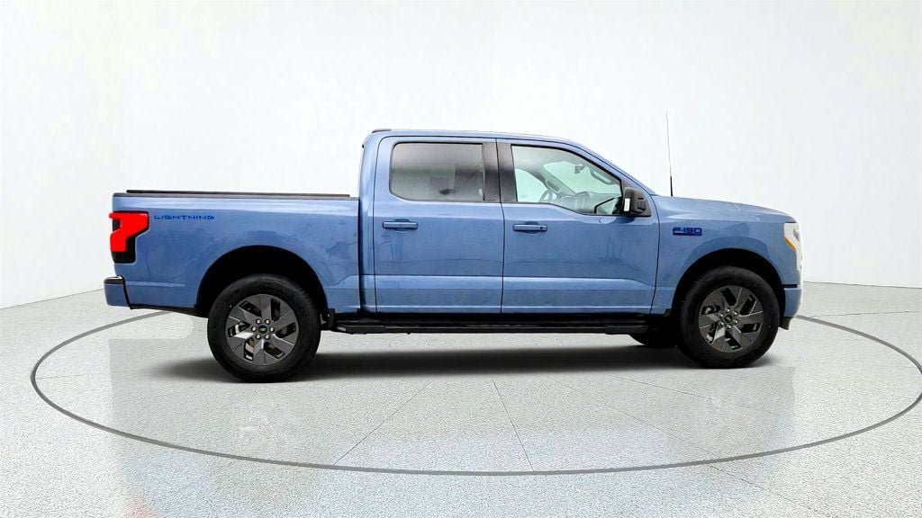 Used 2023 Ford F150 Lightning XLT w/ Equipment Group 312A High AWD/4WD image 4