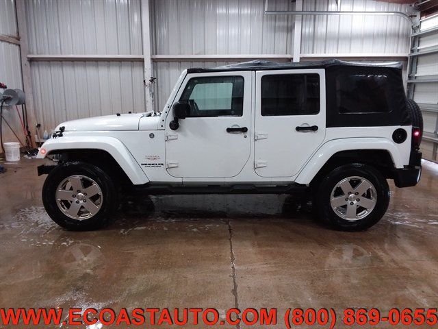 Used 2012 Jeep Wrangler Unlimited Sahara w/ Dual Top Group AWD/4WD image 6
