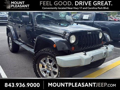 Used 2013 Jeep Wrangler Unlimited Sahara w/ Dual Top Group AWD/4WD image 1