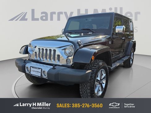 Used 2014 Jeep Wrangler Unlimited Sahara w/ Dual Top Group AWD/4WD image 1