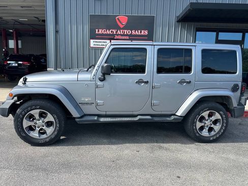 Used 2013 Jeep Wrangler Unlimited Sahara w/ Trailer Tow Group AWD/4WD image 2