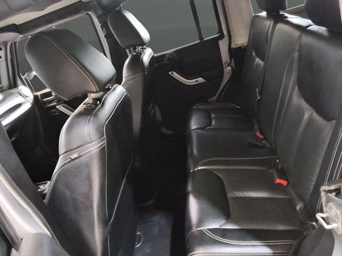 Used 2014 Jeep Wrangler Unlimited Sahara w/ Dual Top Group AWD/4WD image 21
