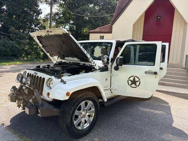 Used 2013 Jeep Wrangler Unlimited Sahara w/ Dual Top Group AWD/4WD image 22