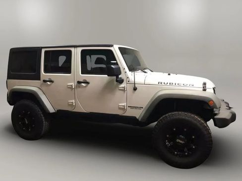 Used 2011 Jeep Wrangler Unlimited Rubicon w/ Dual Top Group image 2