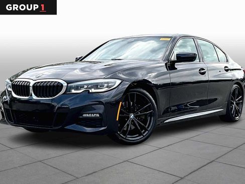Used 2021 BMW 330i Sedan w/ M Sport Package image 1
