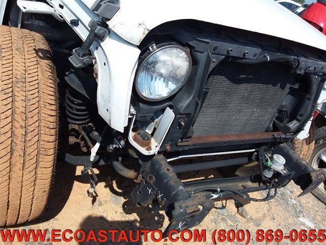 Used 2012 Jeep Wrangler Unlimited Sahara w/ Dual Top Group AWD/4WD image 19