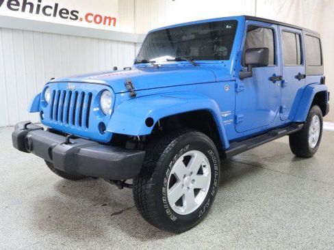 Used 2012 Jeep Wrangler Unlimited Sahara w/ Dual Top Group AWD/4WD image 2