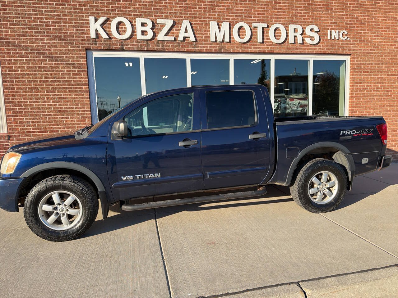 Used 2011 Nissan Titan PRO-4X AWD/4WD image 1