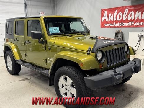 Used 2007 Jeep Wrangler Unlimited Sahara w/ Dual Top Group AWD/4WD image 1
