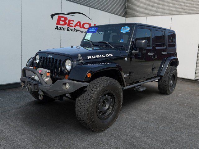 Used 2012 Jeep Wrangler Unlimited Rubicon w/ Connectivity Group AWD/4WD image 1