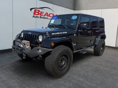 Used 2012 Jeep Wrangler Unlimited Rubicon w/ Connectivity Group AWD/4WD image 1