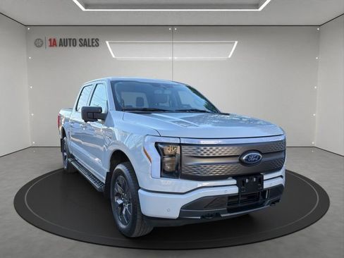 Used 2023 Ford F150 Lightning XLT w/ Equipment Group 312A High image 7