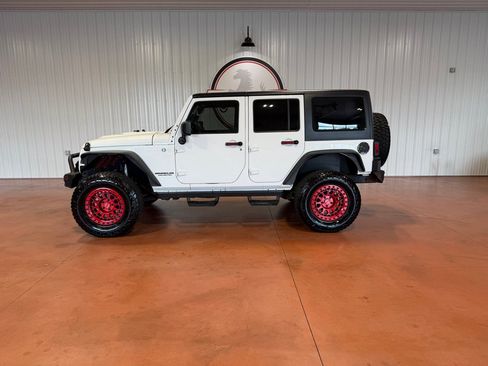 Used 2013 Jeep Wrangler Unlimited Sport AWD/4WD image 2