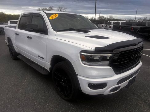 Used 2024 RAM 1500 Laramie AWD/4WD image 1
