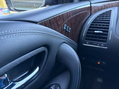 Used 2017 Nissan Armada Platinum w/ Captain Seat Package RWD image 12