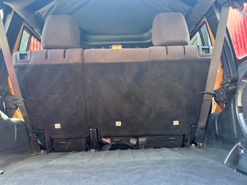 Used 2013 Jeep Wrangler Unlimited Sport w/ Mopar Black Appearance Group image 19