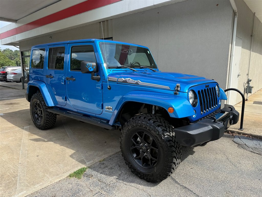 Used 2014 Jeep Wrangler Unlimited Sahara AWD/4WD image 1
