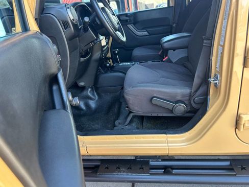 Used 2013 Jeep Wrangler Unlimited Sport w/ Mopar Black Appearance Group image 9