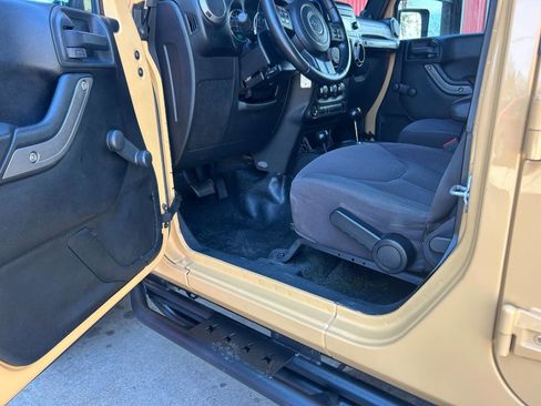 Used 2013 Jeep Wrangler Unlimited Sport w/ Mopar Black Appearance Group image 3