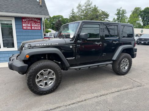 Used 2013 Jeep Wrangler Unlimited Rubicon w/ Dual Top Group AWD/4WD image 2
