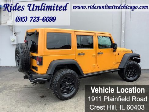 Used 2013 Jeep Wrangler Unlimited Sahara w/ Dual Top Group AWD/4WD image 6