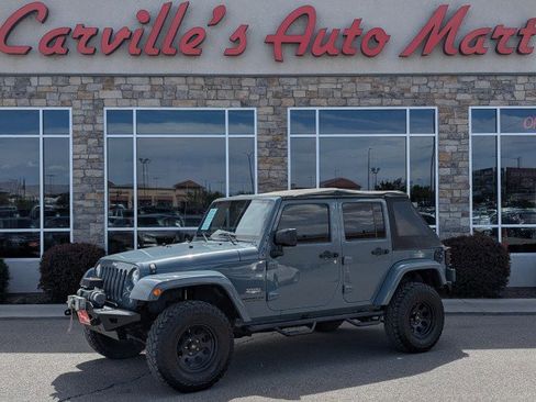 Used 2015 Jeep Wrangler Unlimited Sahara AWD/4WD image 1