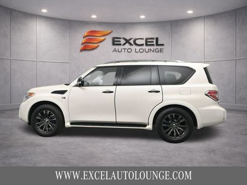 Used 2020 Nissan Armada Platinum w/ Captain's Chairs Package AWD/4WD image 3