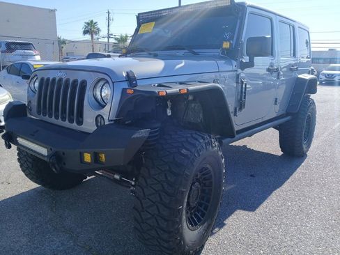 Used 2017 Jeep Wrangler Unlimited Sahara w/ Connectivity Group AWD/4WD image 1