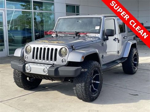 Used 2014 Jeep Wrangler Unlimited Sahara w/ Max Tow Package image 1