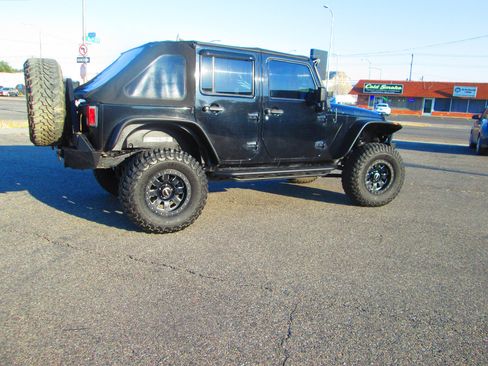Used 2012 Jeep Wrangler Unlimited Rubicon w/ Dual Top Group image 2