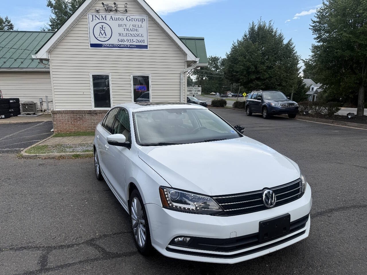 Used 2016 Volkswagen Jetta SEL w/ Lighting Package FWD image 1