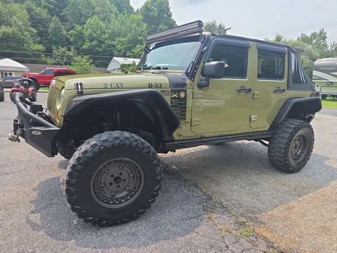 Used 2013 Jeep Wrangler Unlimited Sport w/ Trailer Tow Group AWD/4WD image 1