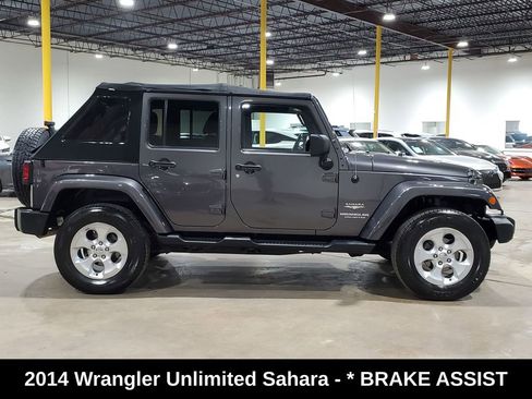 Used 2014 Jeep Wrangler Unlimited Sahara w/ Connectivity Group AWD/4WD image 5