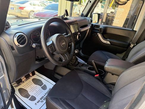 Used 2014 Jeep Wrangler Unlimited Sahara AWD/4WD image 11