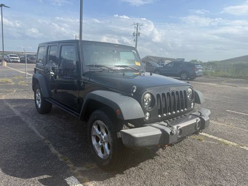 Used 2016 Jeep Wrangler Unlimited Sport AWD/4WD image 1