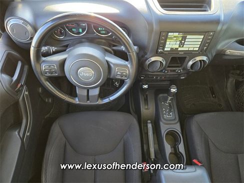 Used 2014 Jeep Wrangler Unlimited Sport w/ Mopar Black Appearance Group image 12