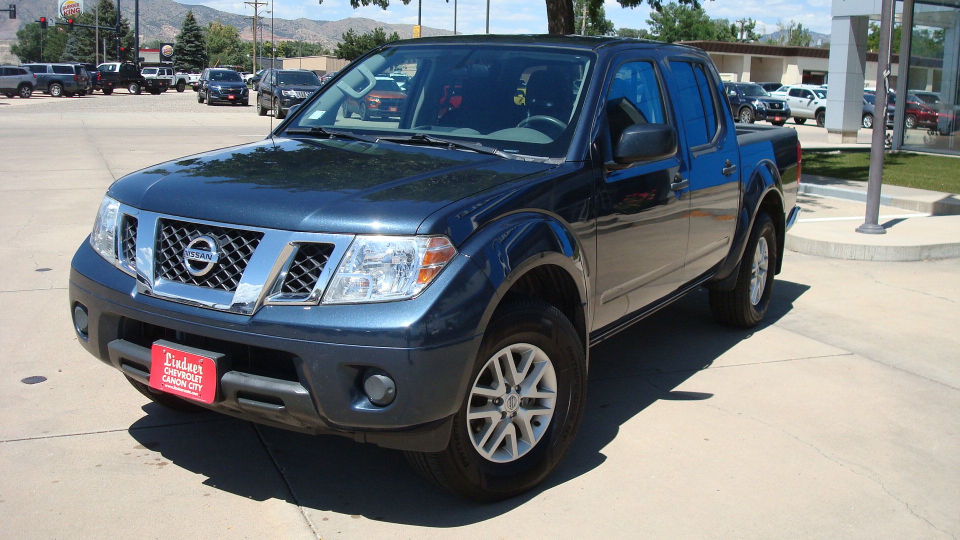 Used 2021 Nissan Frontier SV w/ SV Utility Package AWD/4WD image 1