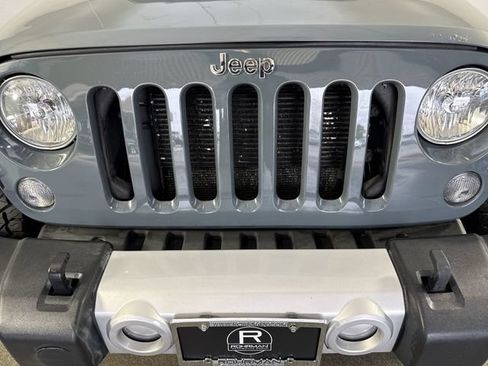 Used 2014 Jeep Wrangler Unlimited Sahara w/ Dual Top Group AWD/4WD image 24