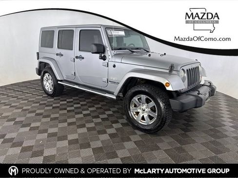 Used 2013 Jeep Wrangler Unlimited Sahara w/ Mopar Chrome Edition Group AWD/4WD image 1