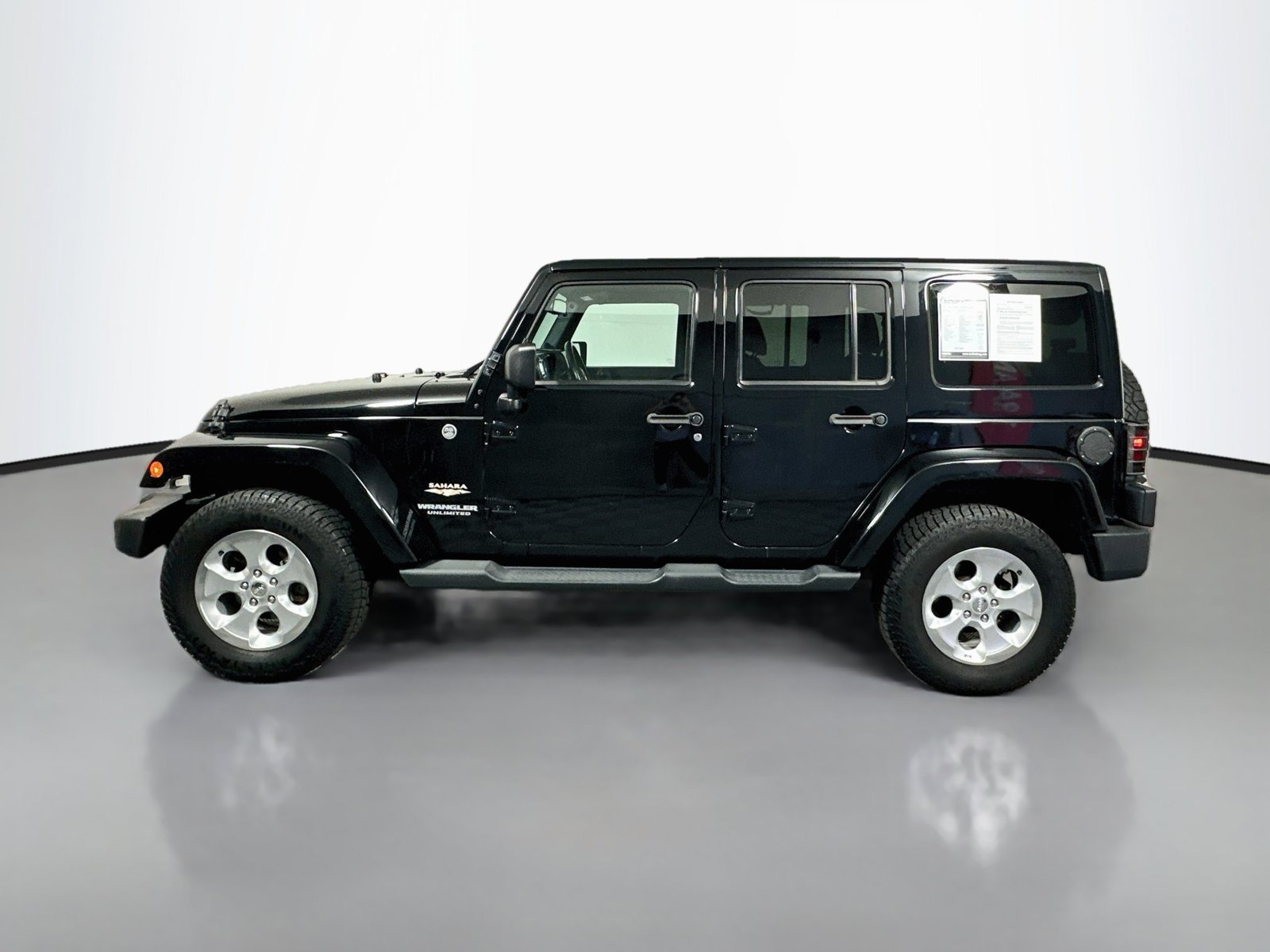 Used 2014 Jeep Wrangler Unlimited Sahara w/ Dual Top Group AWD/4WD image 4
