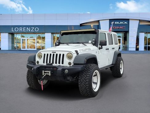 Used 2013 Jeep Wrangler Unlimited Sahara AWD/4WD image 1