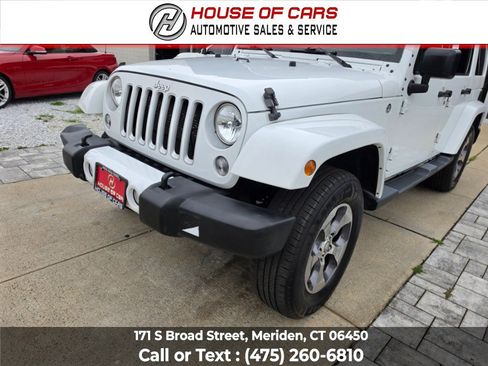 Used 2016 Jeep Wrangler Unlimited Sahara w/ Dual Top Group AWD/4WD image 9