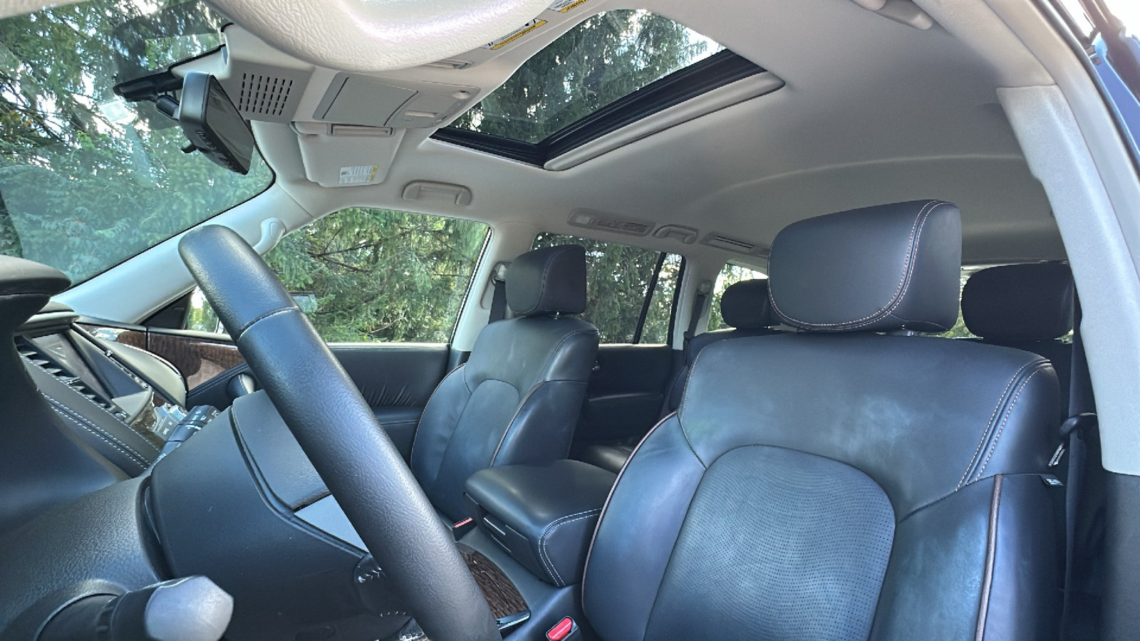 Certified 2019 Nissan Armada Platinum w/ Captain's Chairs Package AWD/4WD image 14