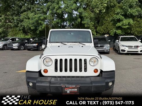 Used 2013 Jeep Wrangler Unlimited Sahara w/ Dual Top Group AWD/4WD image 13