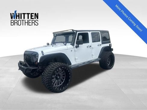 Used 2011 Jeep Wrangler Unlimited Sport AWD/4WD image 1