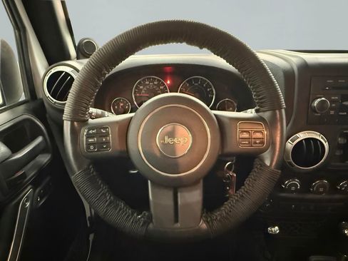 Used 2012 Jeep Wrangler Unlimited Rubicon w/ Dual Top Group image 14