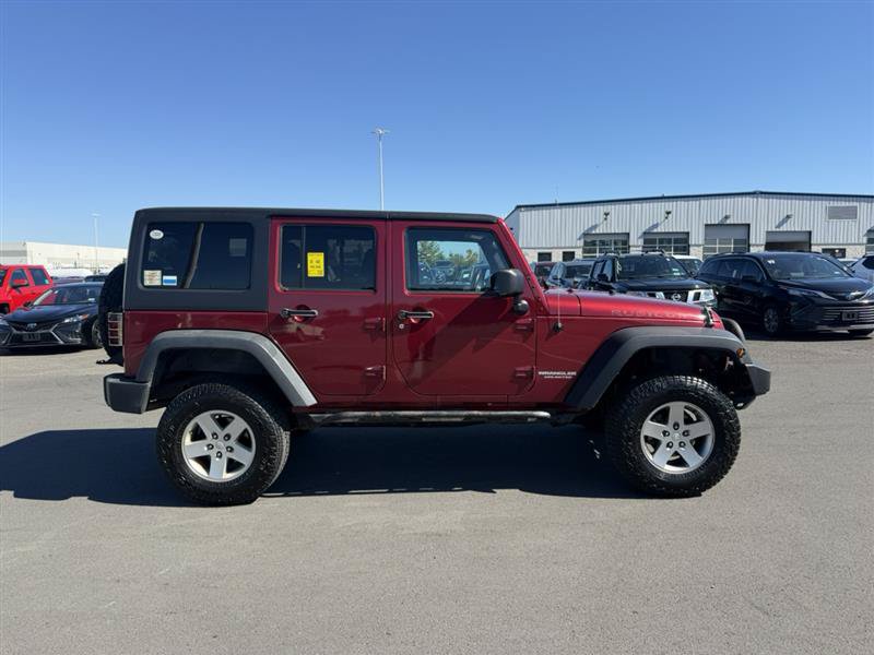 Used 2012 Jeep Wrangler Unlimited Rubicon w/ Dual Top Group AWD/4WD image 4