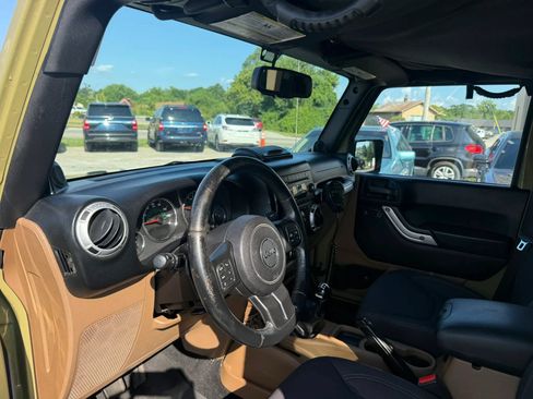 Used 2013 Jeep Wrangler Unlimited Sahara w/ Dual Top Group AWD/4WD image 11